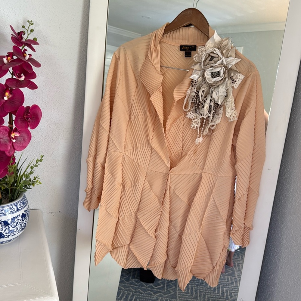 Elegant Peach Women's Top with Floral Accent